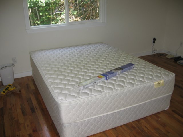 beforewecouldmoveinweneededamattressandsomeblindsinthebedroom.jpg