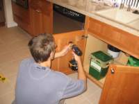 hangingourfoodtrashbinunderthesink_small.jpg