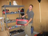 puttingupshelvesinthegarage_small.jpg
